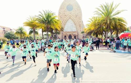 Immokalee Elementary School students set-off for the kids “1-mile fun run”
